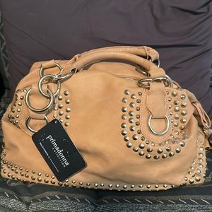 Tan hand bag